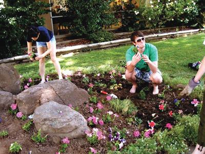 Circle K members perform garden work at Pioneer House Nursing Facility in Sacramento.