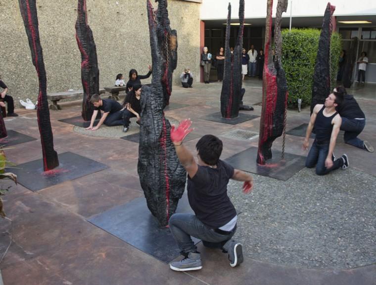 Dance students perform among sculptures in a reception for Gong Yuebin’s art exhibit “Crossroads” outside of the Else gallery in Kadema Hall on Wednesday, April 13. The exhibit will run until April 22.