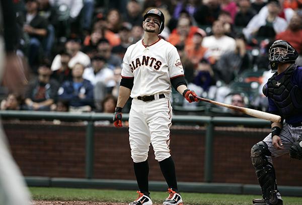 San Francisco Giants Cody Ross (13) reacts to a foul ball that
was caught for an out against the Colorado Rockies in the third
inning at AT&T Park in San Francisco, California, on Saturday,
June 4, 2011. The Rockies beat the Giants 2-1. (LiPo Ching/San Jose
Mercury News/MCT)
