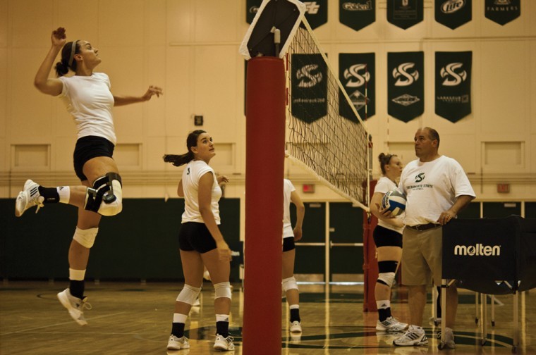 
Senior Anna Schoener prepares to spike the ball in practice
on Aug. 24.
