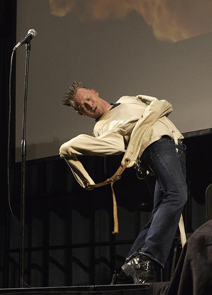 Comedy magician Brian Brushwood struggles to escape from a
straightjacket during Thursday’s show in the University Union
Ballroom.
