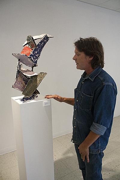 Artist Tom Decker describes his piece Indian Rock at the
Robert Else Gallery.
