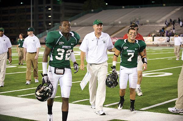 From left to right: DB Osagi Odiase, head coach Marshall
Sperbeck, DB Kyle Monson.
