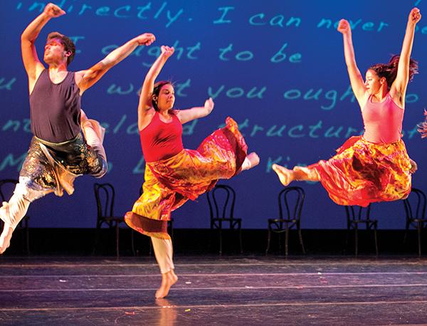 Alex Hades dance major, Leanne Ruiz dancer, and Alice Lee
international student, leap into the air during Dance Sites Monday
in Shasta Hall.
