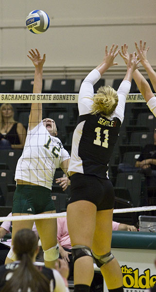 Outside hitter Janelle Currey spikes the ball during Friday's
game against Seattle. The Hornets won the match 3-1.
