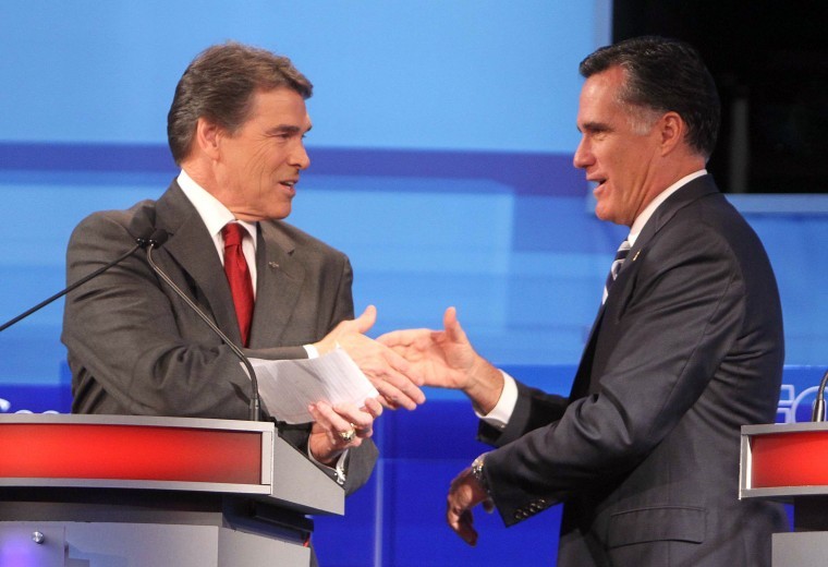 Texas Gov. Rick Perry, left, and former Massachusetts Gov. Mitt
Romney, right, shake hands at a debate. They are the two
front-runners for the Republican Party.
 
