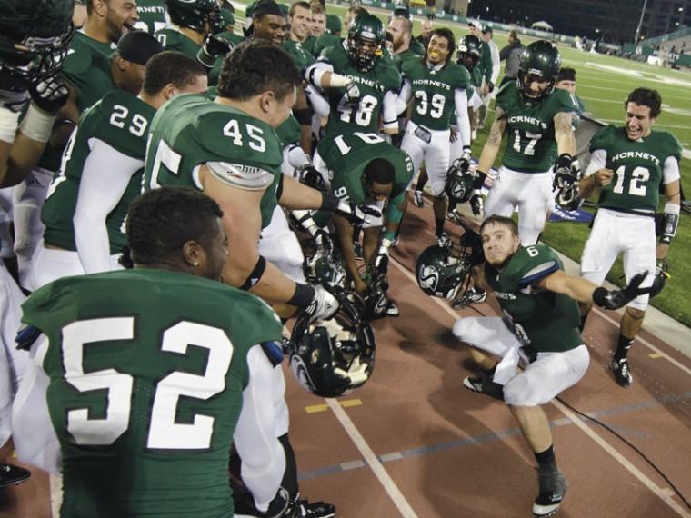 Junior defensive back Ryan McMahon does a victory dance for his
teammates after Saturday night’s win over Idaho State. McMahon made
five tackles including one tackle for a loss, a sack and a blocked
punt.
