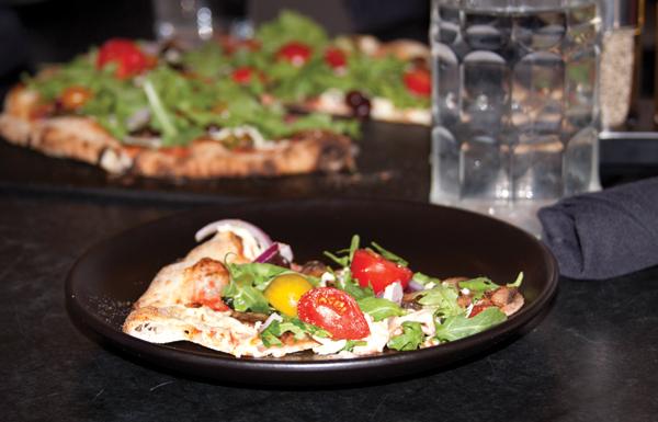 A slice of vegan pizza from Hot Italian was one of the entries
in the Vegan Chef Challenge.
