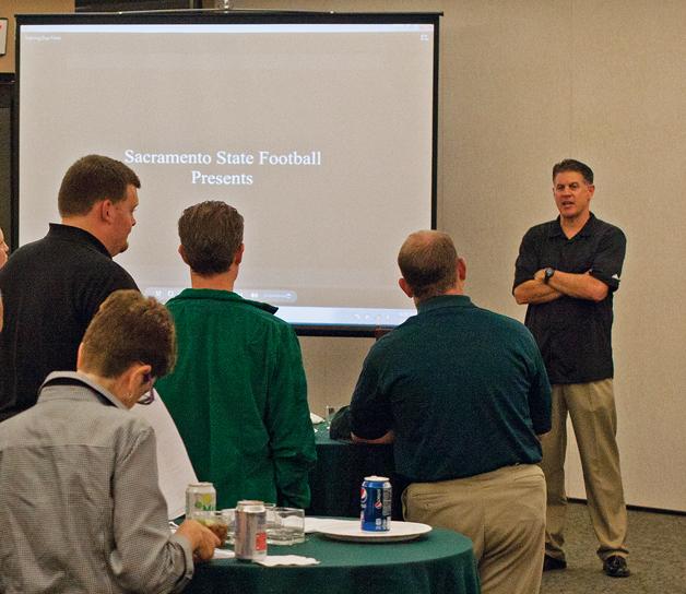 Sacramento State football head coach Marshall Sperbeck begins
the highlight reel in front of an enthusiatic audience on Feb. 1
during the teams signing day.
