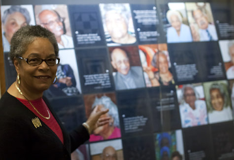 Professor Emeritus of Business Law Felicenne
Ramey poses in front of her exhibit,