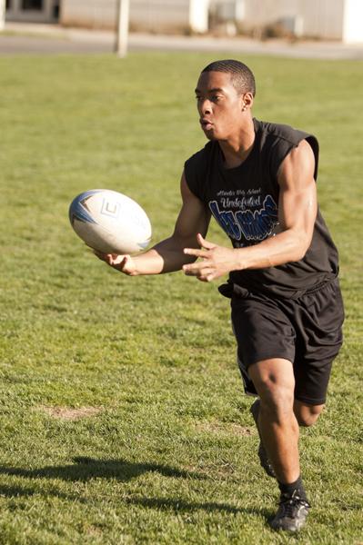 Hornet Rugby club members run drills in the warm sun on the rugby field behind Yosemite Hall on Friday. The 40-member club has been ranked as high as No. 9 in the nation this season.
