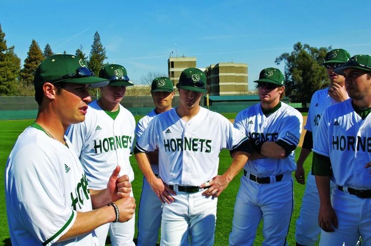 Sacramento State baseball’s assistant coach Tommy Nicholson (front left) played six years of minor league baseball, played colliegately at the University of Texas and coached there as well under head coach Augie Garrido. Now he looks to draw from his experiences when coaching the Hornets this year.
