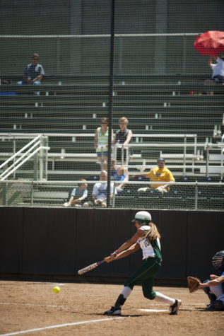 Senior catcher Marissa Navarro rips a hit during Sunday's doubleheader sweep of Bakersfield.