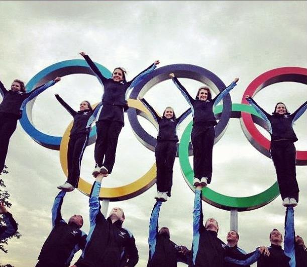 Varsity Cheerleading representing UCA stunting in front of the 2012 Olympic Rings in London. 
