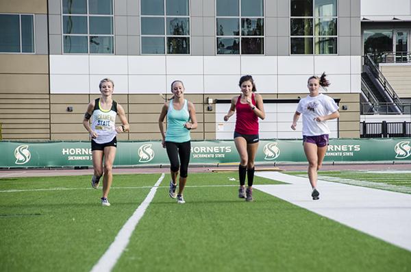 Cross country practices are at 8 a.m. to prepare for meets. Morgan Dampier, Emily Johnston, Brianna Luna and Stephanie Rasmussen (all pictured above) are freshmen.

