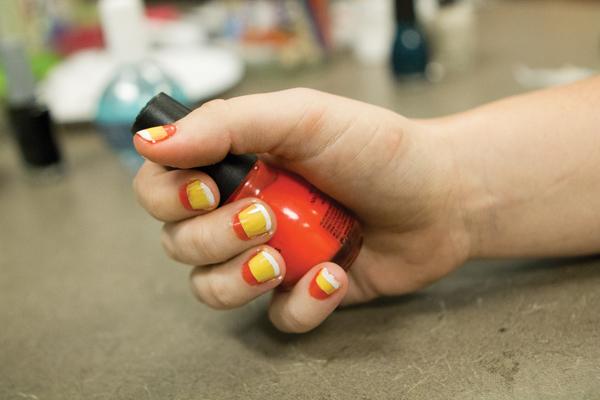 A few simple, easy-to-find supplies and a few different colors of nail polish means you can make your nails look great for Halloween.
