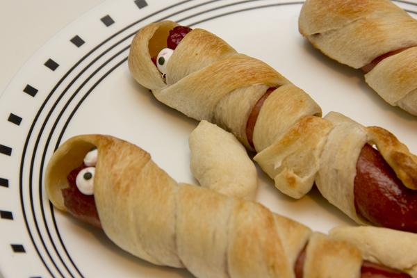 Enjoy these mummy hot dogs with family and friends at a Halloween party this fall. Serve them with a side of ketchup or barbecue sauce for dipping.
