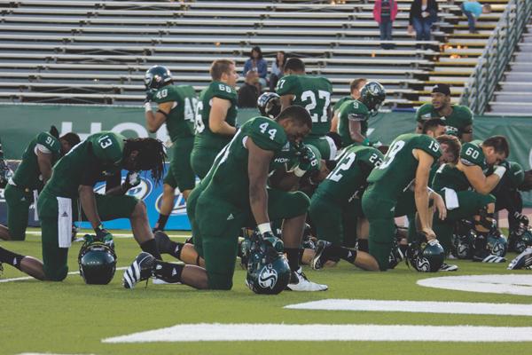 After entering Hornet Field, the players paused for a moment of silence for the loss of their late teammate No. 43 John Bloomfield. Bloomfield passed away Sunday, Oct. 21.
