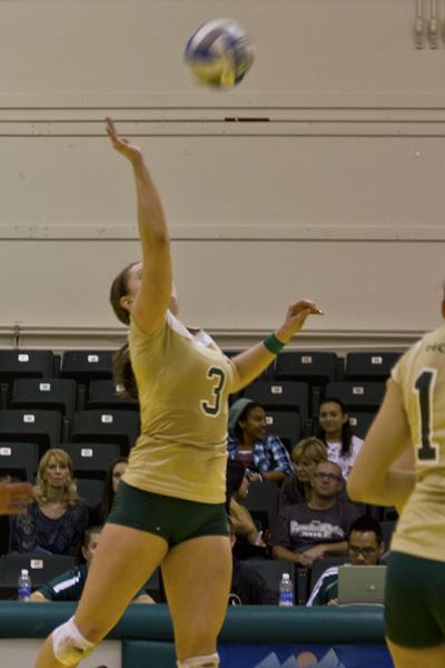 Senior outside hitter Jessie Genger returns the volleyball during the game on Saturday afternoon.
