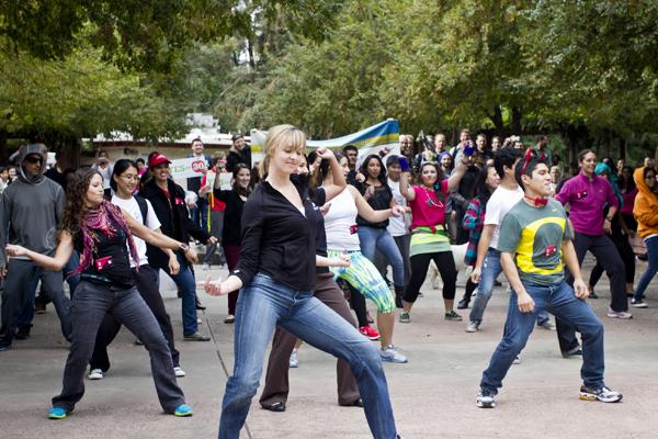 A group of Sacramento State students gathered in the Library Quad to have a flash mob in support for Yes on Prop 30.

