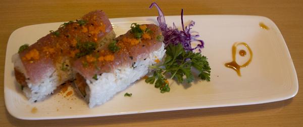 Gails special is a spicy tuna roll with cucumber and sauce.
