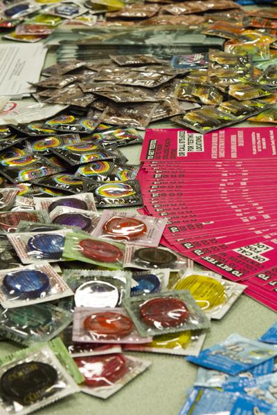 A booth at the HIV/AIDS Health Fair offering free condoms for students to promote World AIDS Day on Wednesday in the University Union.
