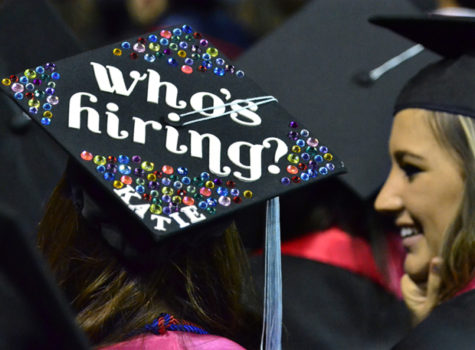Many of the caps of the graduates carried messages, such as the one by Kara Crookston, left, during Fresno State University's 101st Commencement at the Save Mart Center in Fresno, California, on Saturday, May 19, 2012. (John Walker/Fresno Bee/MCT)