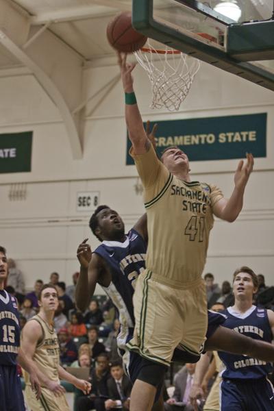 Hornet senior center No. 41 Konner Veteto makes a layup against the Bears on Saturday evening in the Nest.
