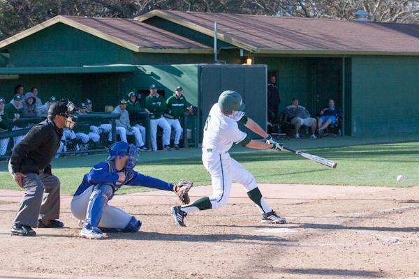 Hornet freshman No. 6, Chris Lewis, hits against Riverside in the second game of the doubleheader in John Smith field on Saturday.
