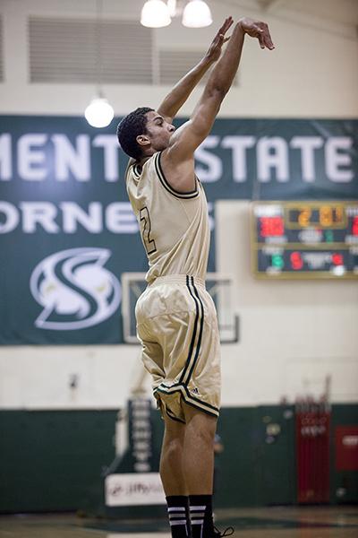 Hornet freshman guard No. 2, Cody Demps, shoots a jump shot Feb. 4 against Northern Arizona.
