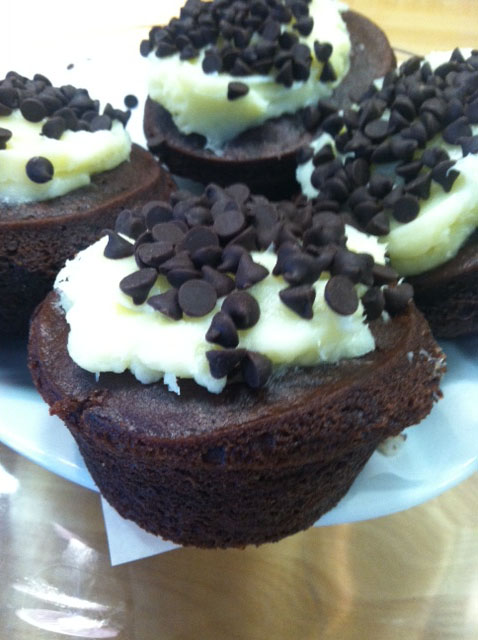 The $3 black bottom cupcake from Yellowbill Café and Bakery is a moist chocolate cupcake with a sweet cream cheese filling and topped with cream cheese frosting and chocolate chips. 
