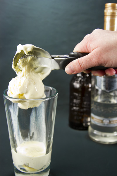To make a glass of this childhood treat, pour Baileys Irish cream liqueur and vanilla vodka into the cup, and then add a scoop of vanilla ice cream.
