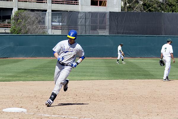 Roadrunner junior first baseman No. 9, Cael Brockmeyer, rounds the bases after hitting a three-run home run in the 10th inning on Sunday against the Hornets.
