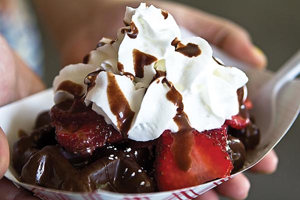 The “Chocolate Most Wanted” from VolksWaffle California is a chocolate-dipped waffle topped with strawberries, whipped cream and Nutella.
