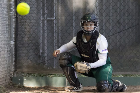 Hornet sophomore catcher No. 9 Kortney Solis warms up fo their game against Weber State on Friday in the bullpen at Shea Stadium.