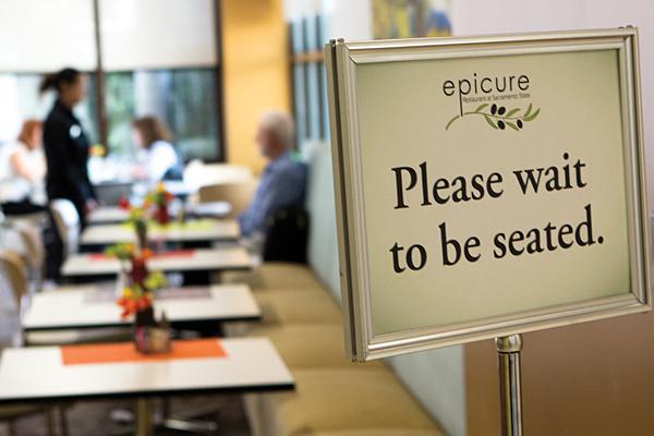 Epicure Restaurant at Sacramento State offers dishes for vegetarian and vegan diners such as the vegetable muffuletta and the black bean burger served with French-fried onion strings.
