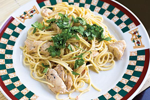 Once the cajun chicken pasta is mixed to your liking, just sprinkle the top with some cilantro and it is ready to be served.
