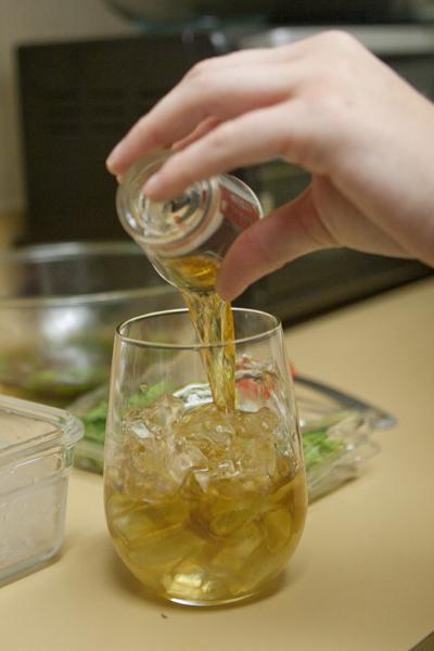 After letting the sugar water mix sit overnight in the refrigerator, pour into a sizable glass with ice and whisky or bourbon. Alternative serving glassware could be silver or pewter cups.
