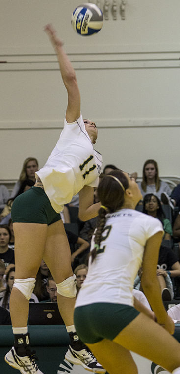 Sloan Lovett spikes the ball during the Hornets’ 3-1 victory against Northern Arizona on Friday.