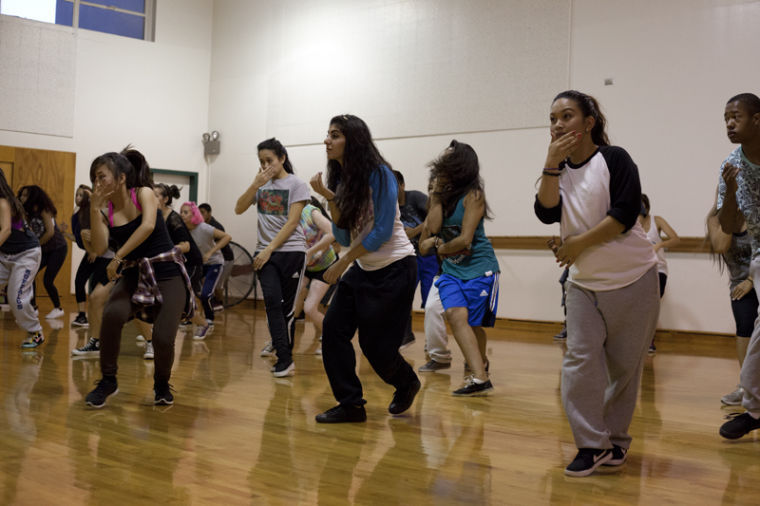 Members of Sac Modern are practicing their hip-hop dance moves at the groups workshop.