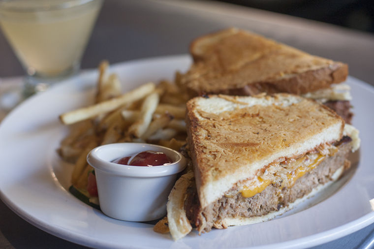 A visit to Ink wouldn't be complete without trying the famous meatloaf sandwich topped with cheese, crispy onions and topped with a crispy parmesan bread.