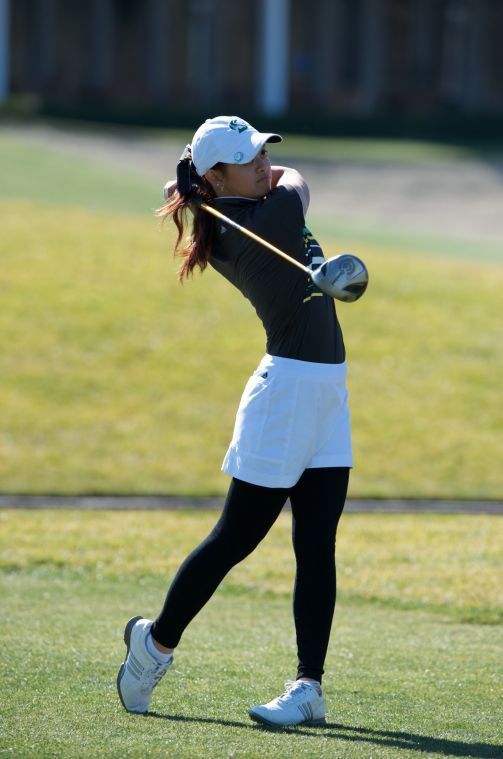 Sagee Palavivatana practices her swing for the womens golf team.