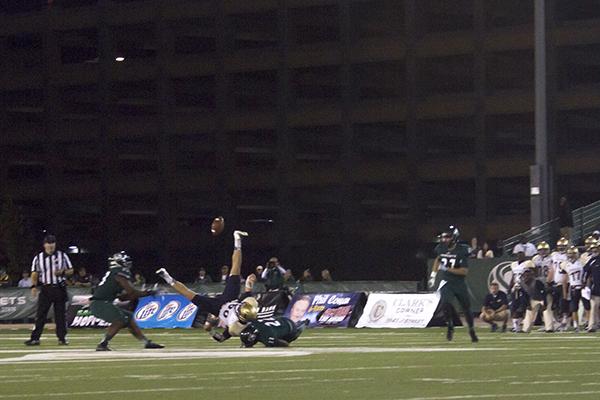 No. 53 senior line backer Todd Davis, picks up an interception.