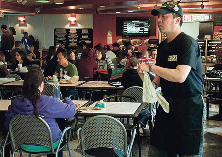 Cheng Wang sold Togo’s sandwiches in the Riverfront Center in 2011.