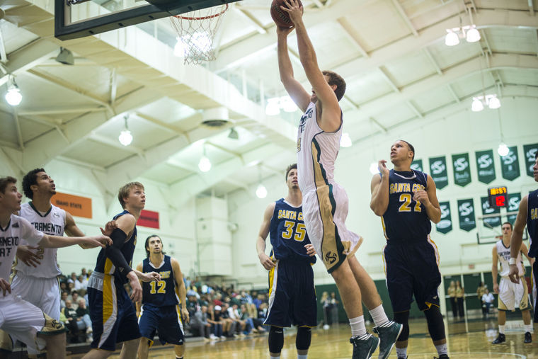 Junior forward No. 34 Alex Tiffin scores against the UC Santa Cruz Banana Slugs on Friday at the Nest.