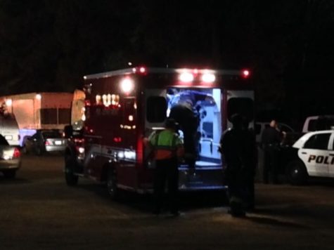 An unidentified man was taken to a local hospital after being involved in a fight that broke out in the student section.