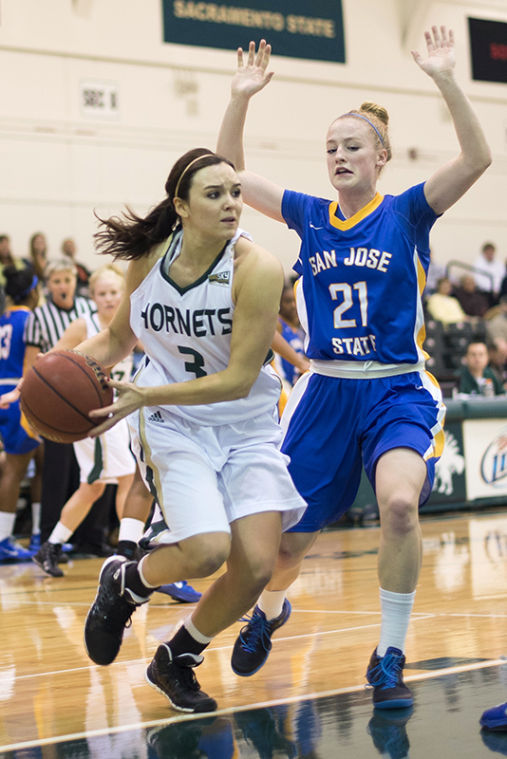 Freshman guard No. 3 Gigi Hascheff fights past the San Jose State Spartans at the game on Saturday in the Nest.