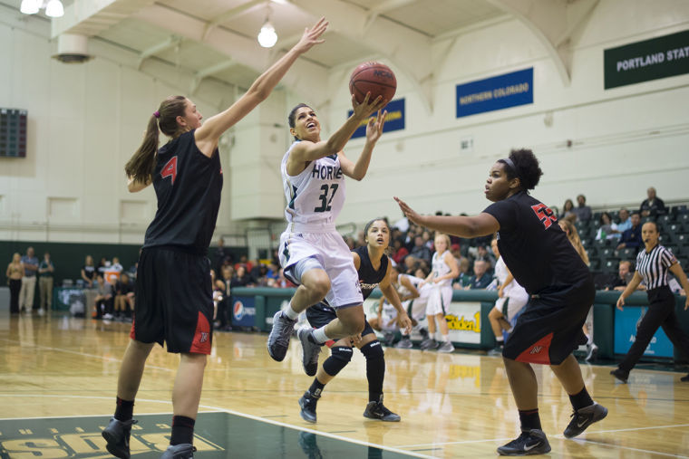 Junior guard No. 32 Andrea Chenier attempts to score at the game on Nov. 8 at the Nest against the Cal State Northridge Matadors.