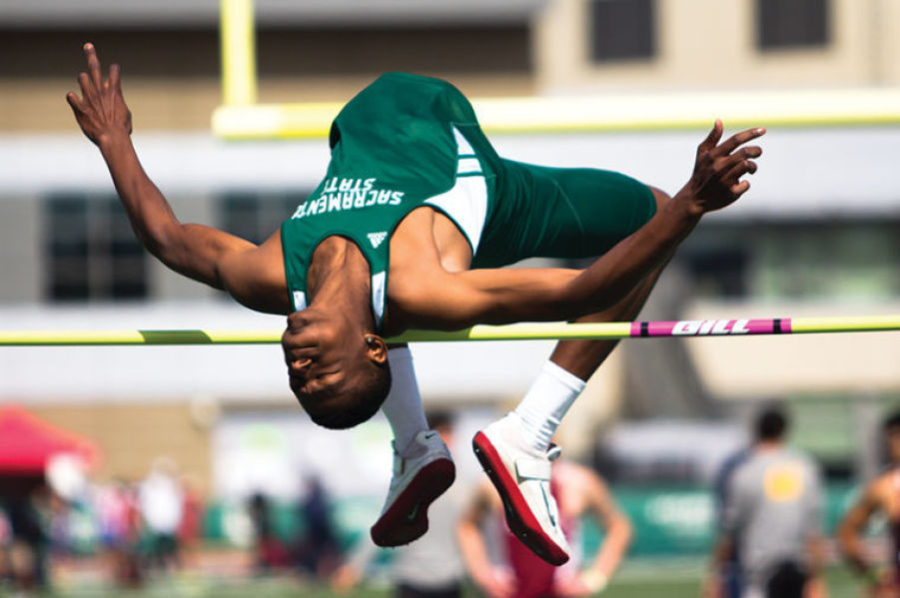 Sacramento States Londeen McCovery attempts a high-jump during a meet in Hornet Stadium. 