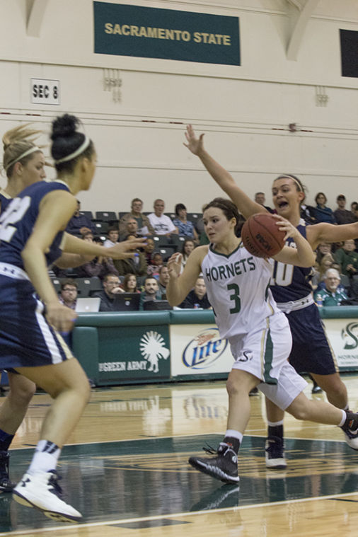 Freshman guard Gigi Hascheff drives into the key during a game in The Nest. 